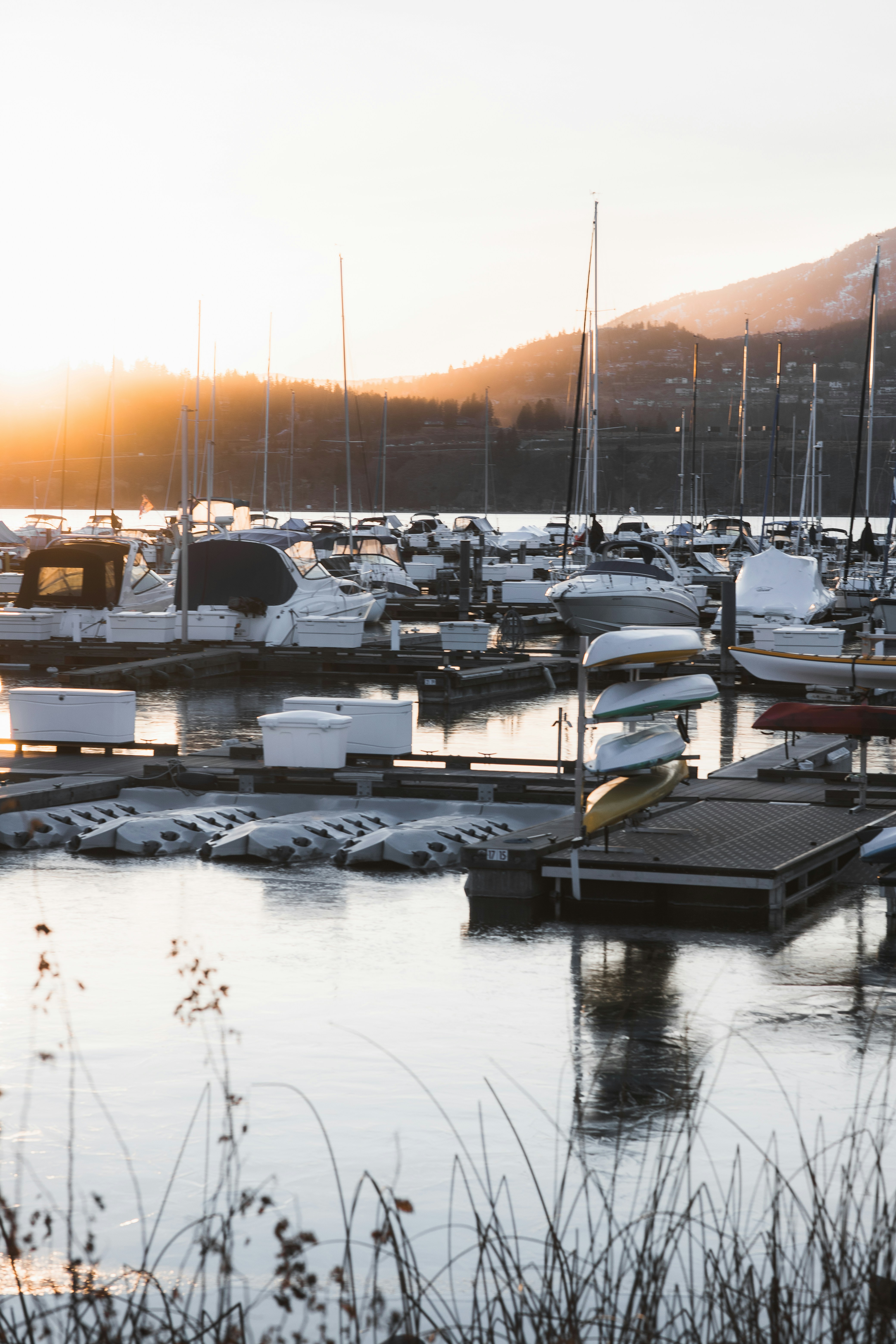 Beautiful marina at sunset with boats docked in Kelowna